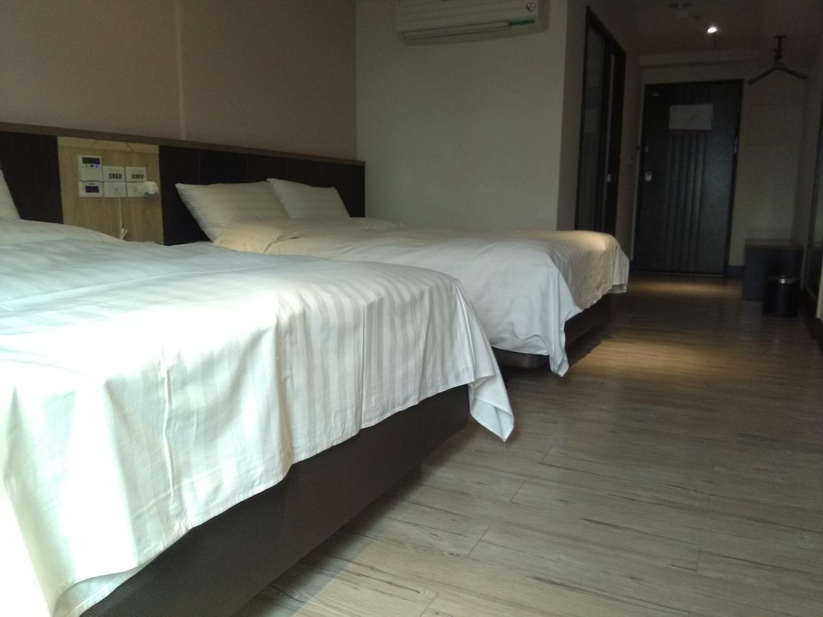 Dengfeng Milan Business Hotel Huwei Eksteriør billede