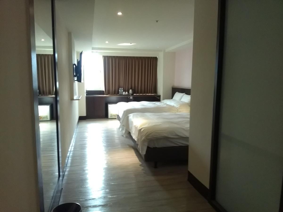 Dengfeng Milan Business Hotel Huwei Eksteriør billede