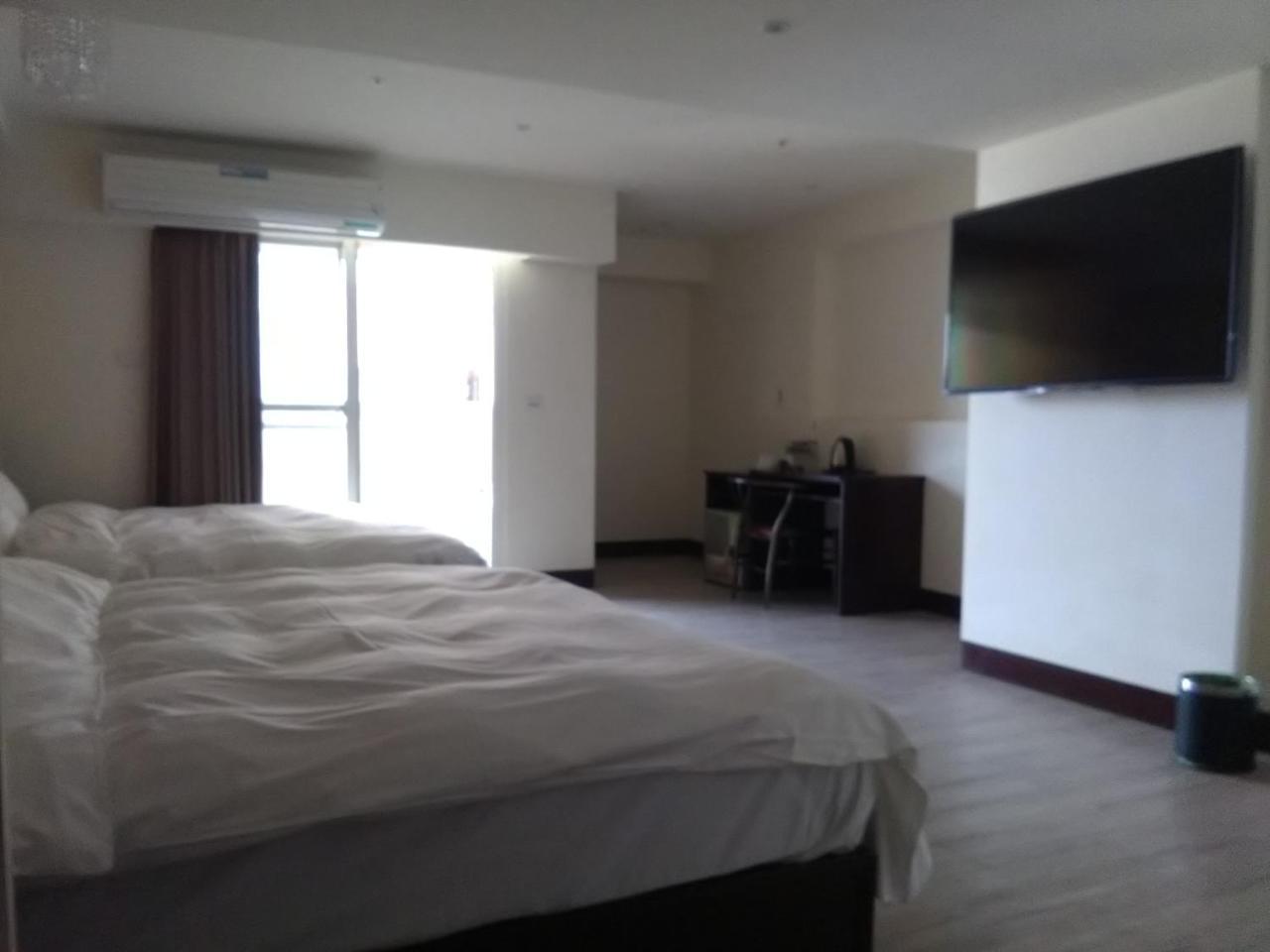 Dengfeng Milan Business Hotel Huwei Eksteriør billede